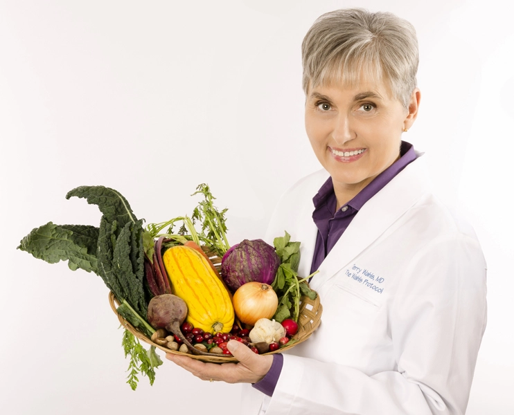 Dr. Terry Wahls holding vegetables