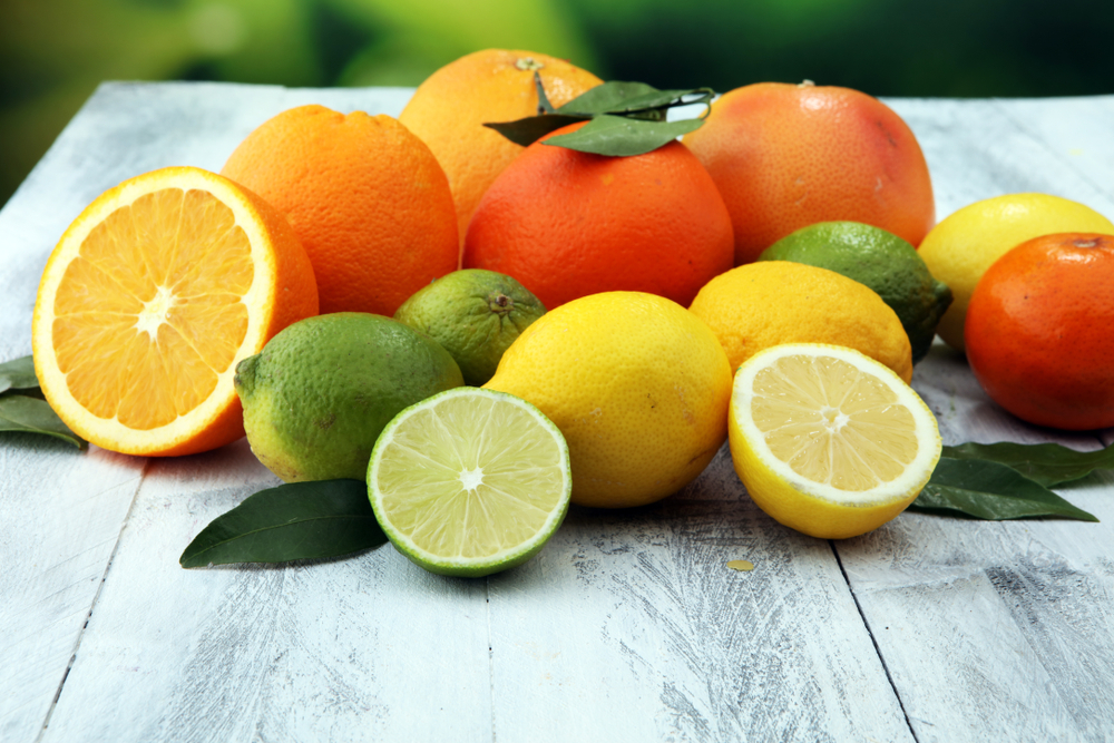 various citrus fruits on table